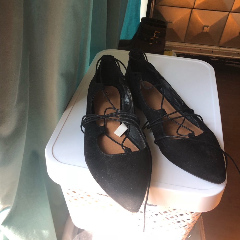 Black laceup flats
